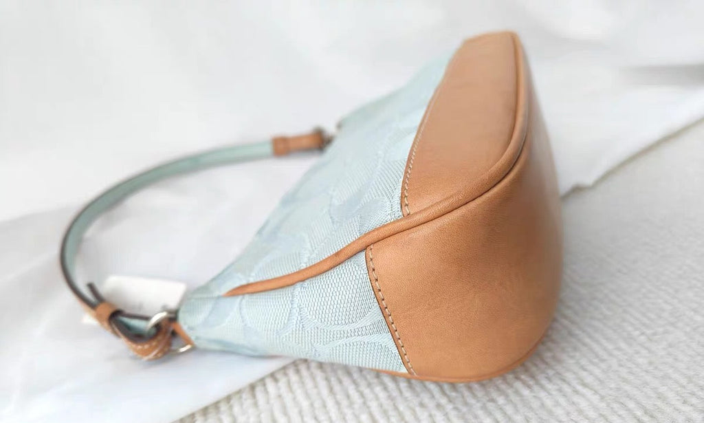 Vintage Coach Soho Signature Demi Shoulder bag in Baby Blue
