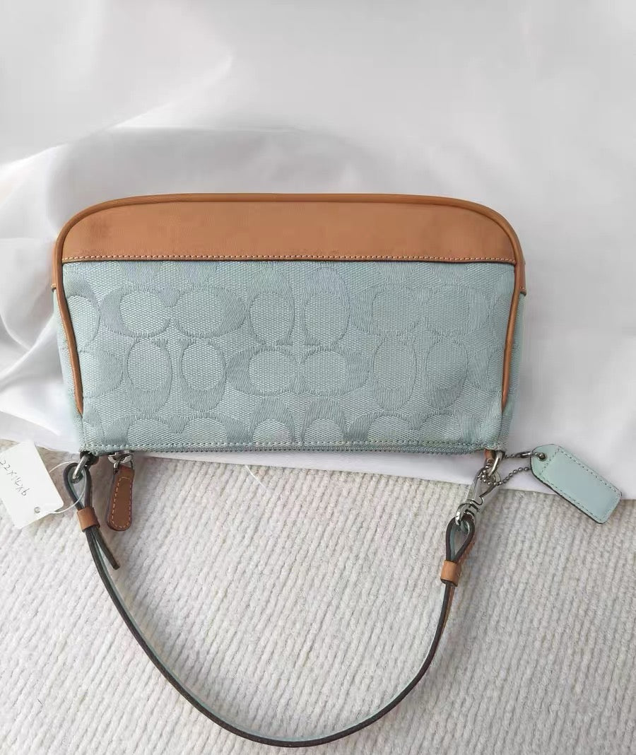Vintage Coach Soho Signature Demi Shoulder bag in Baby Blue